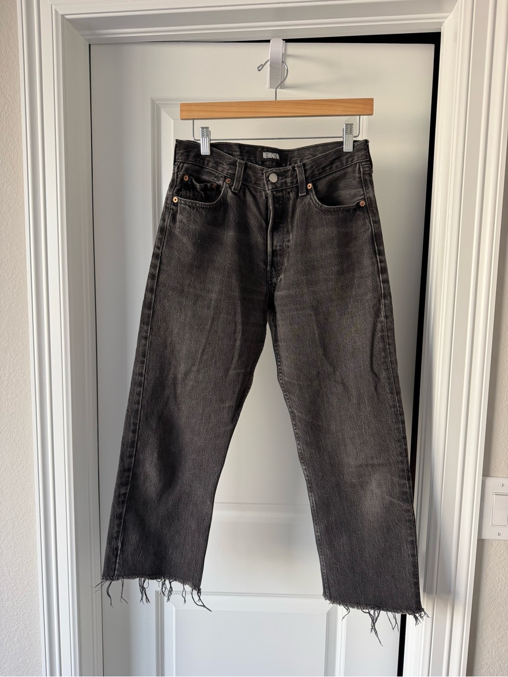 Reformation  x Levis Black Straight-Leg Jeans with Raw Hem